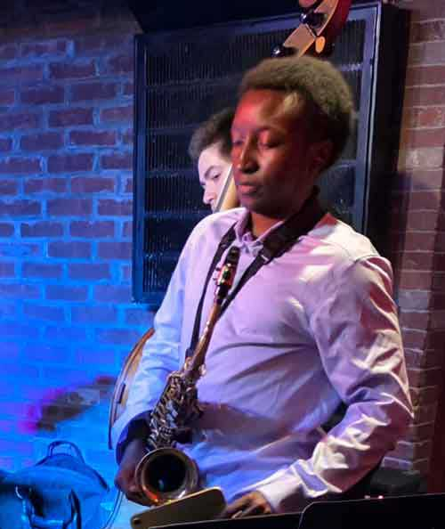 Talli Kimani saxophonist performing at wally's cafe jazz club