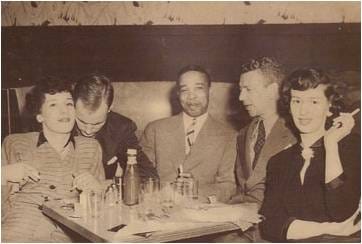 Joseph "Wally" Walcott with patrons at Wally's Paradise, 1940s