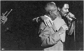 Mr. Walcott receiving an award from Solomon "Sonny" Carrington III, founder of the Boston Jazz Society